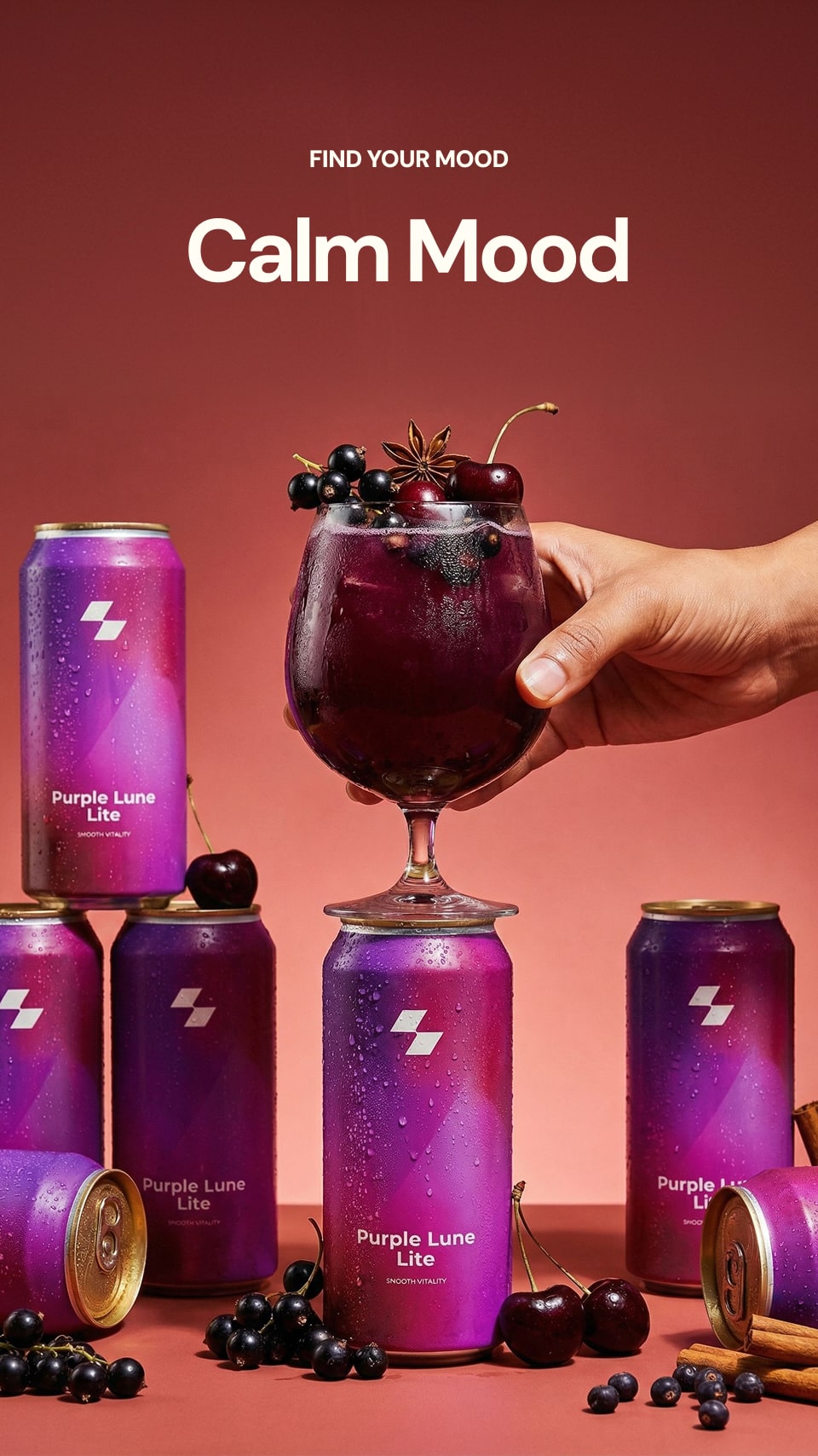 Purple Lune Lite cans with a glass of dark liquid and cherries on a red background.