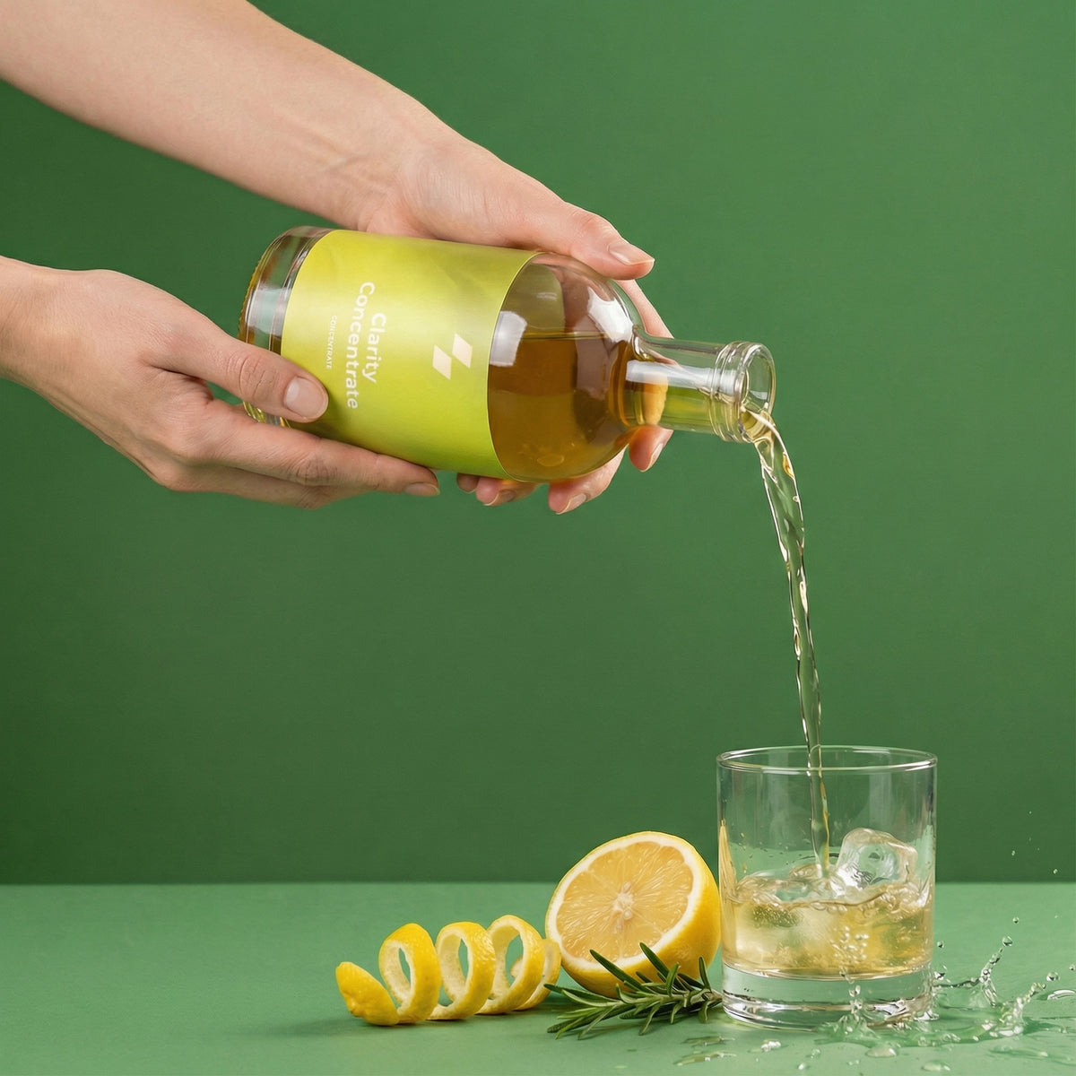 Person pouring a drink from a bottle labeled 'Cucumber' into a glass with ice and lemon slices on a green background.