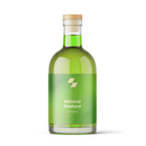 Green bottle labeled 'Mineral Restore' on a white background (24 oz / 700 ml)