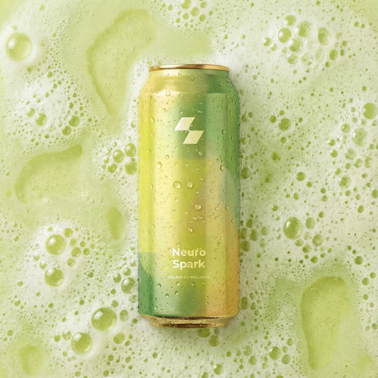 Green can with 'Neuro Spark' branding on a green bubbly background